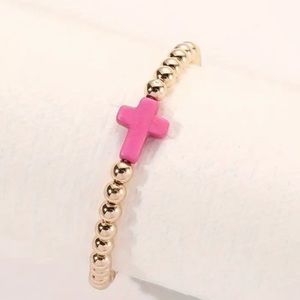 Gold beaded pink cross bracelet